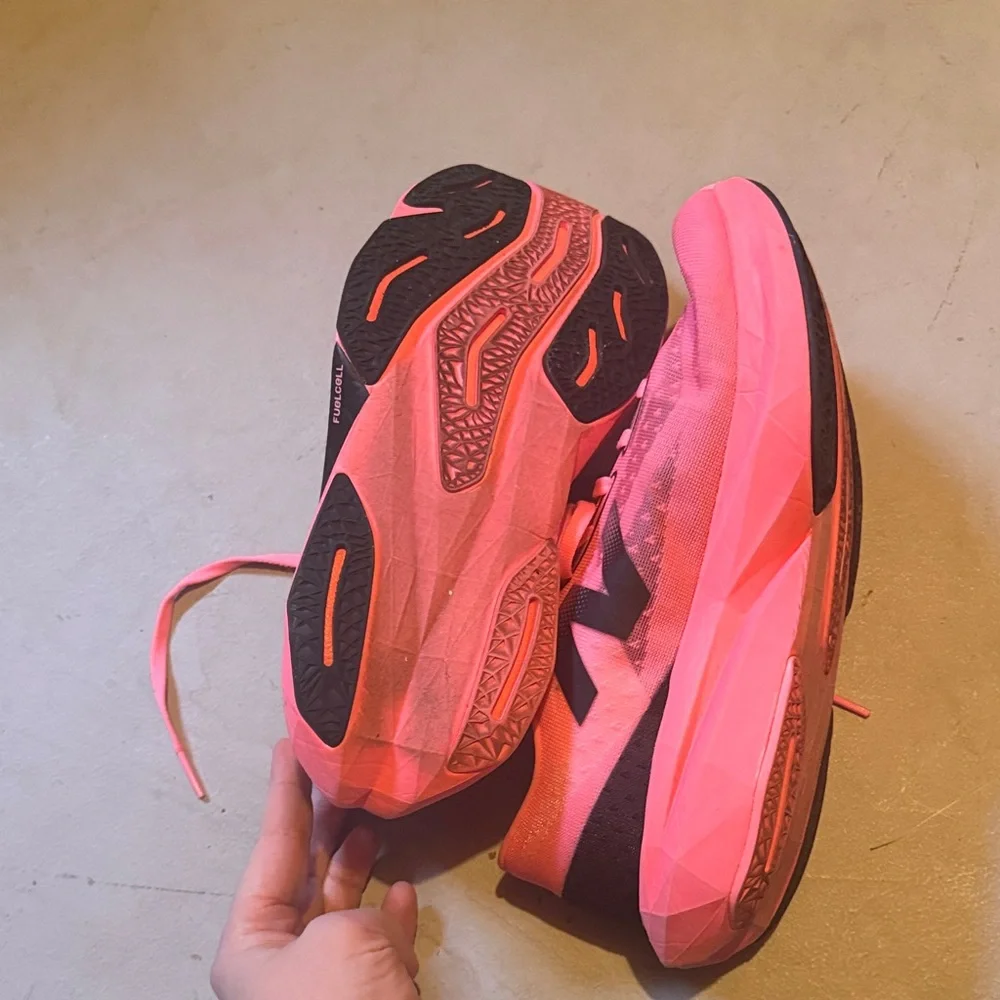 New Balance FuelCell Rebel v4
Women's Pink and Black Athletic Shoes - Picture 3 of 8